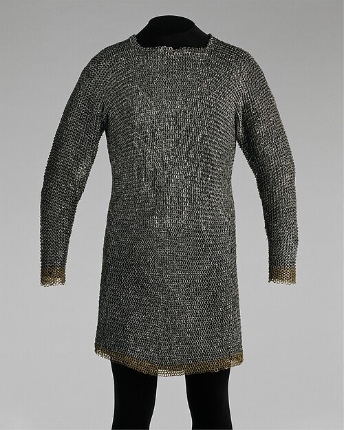 A 15th-century German mail shirt made of interlinked steel and brass rings